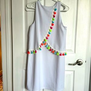 White dress with tassels